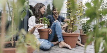 Happy Couple With Plants Relaxing On Balcony Josf01591 780x439[1]